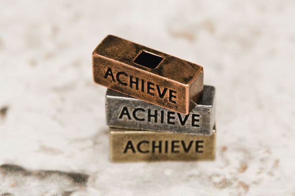 Achieve Brick 212 west personalized necklaces and word blocks